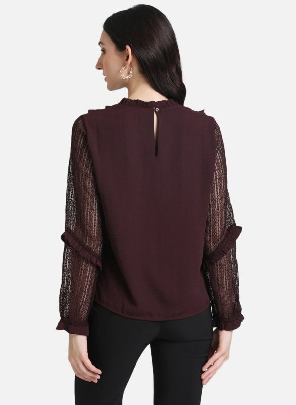 KAZO TOP WITH RUFFLES AT NECK AND SLEEVES.