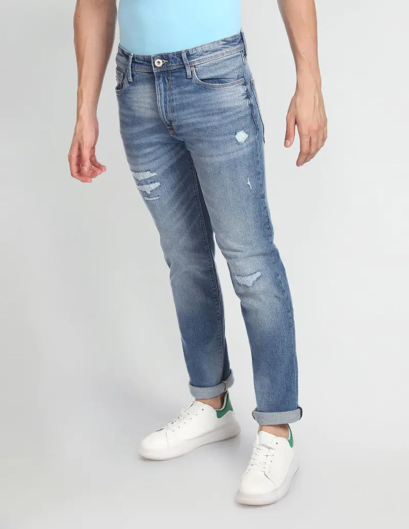 Mid Rise Stone Wash Distressed Jeans