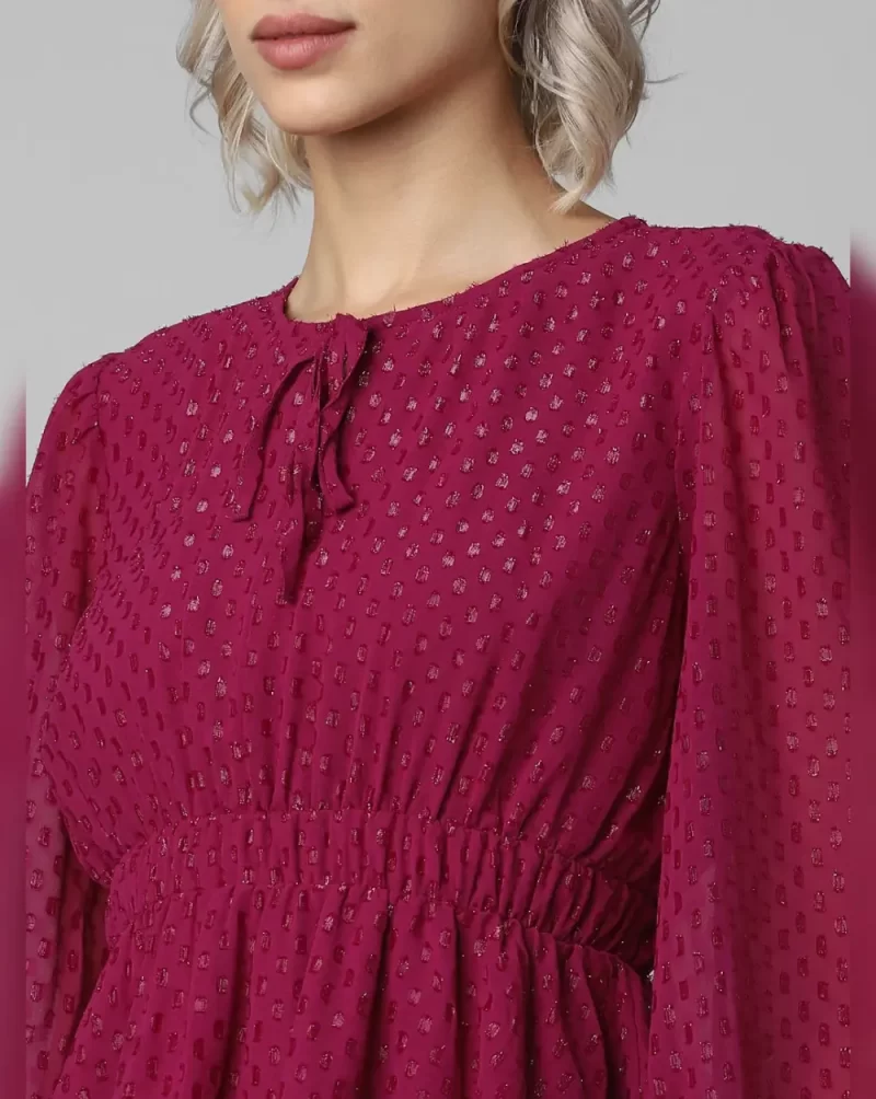 PLUM DOBBY PEPLUM TOP