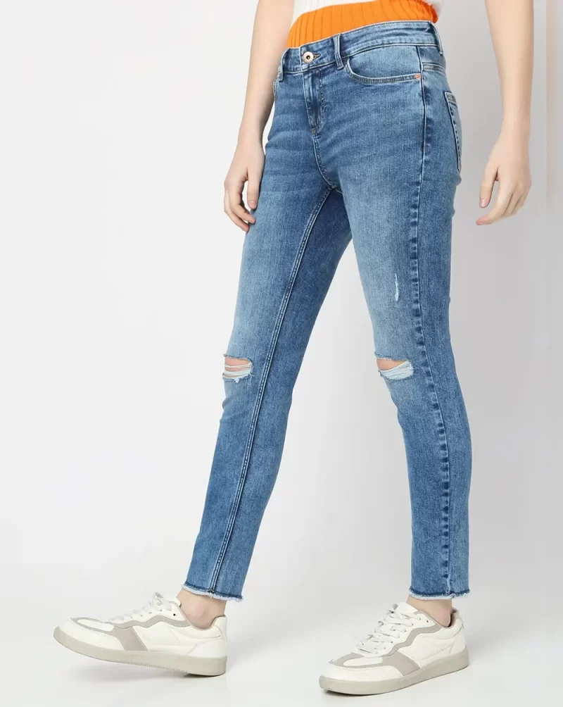 BLUE MID RISE DISTRESSED SKINNY JEANS