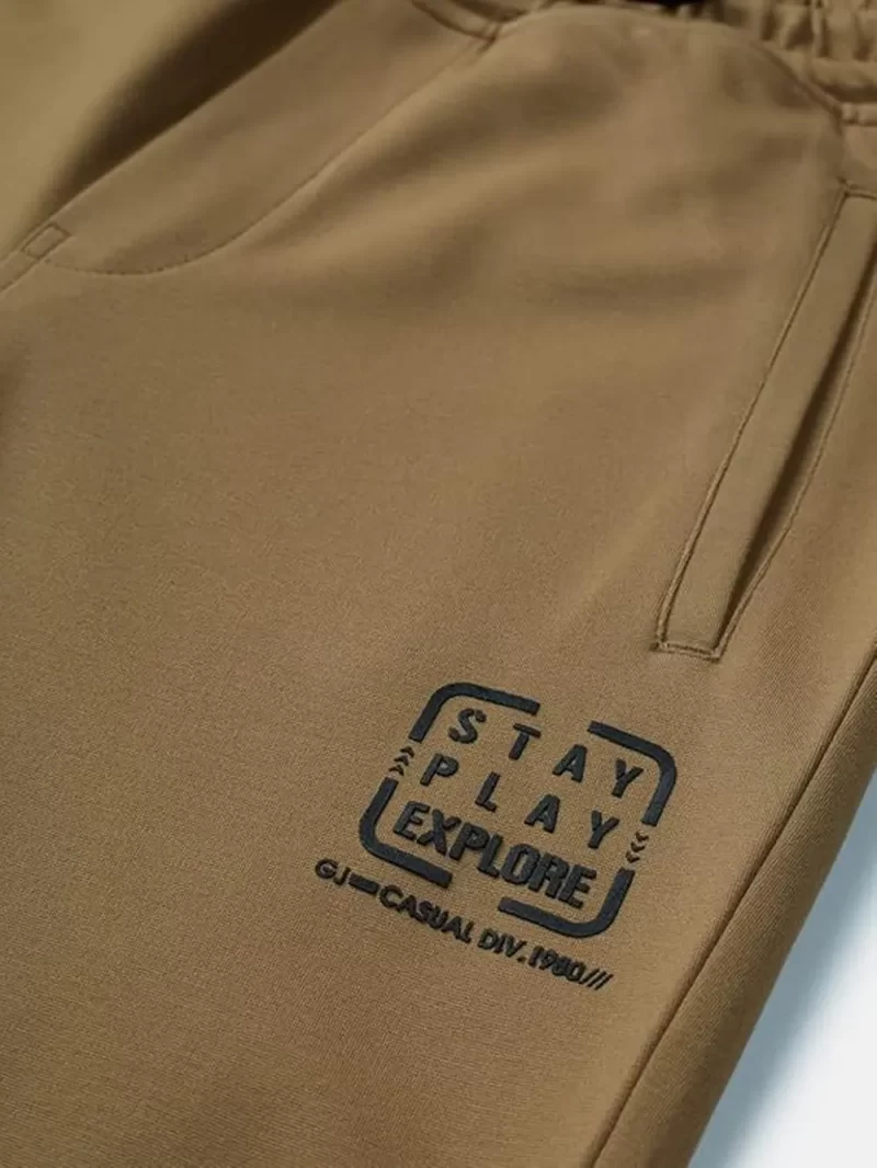 Gini & Jony Boys Brown Solid Polyster Elasticated Track Pant